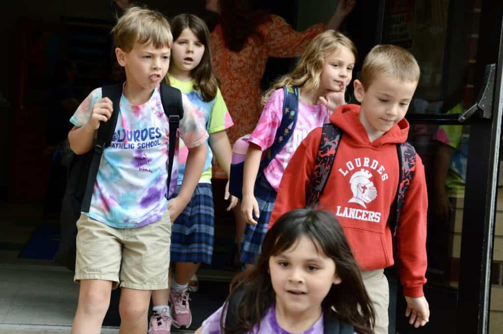 Kids leaving school.